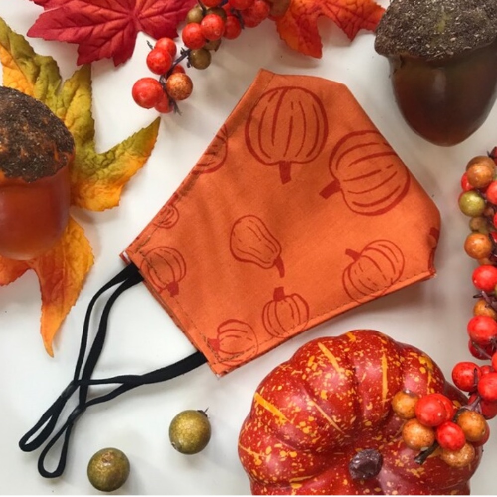 Pumpkin print face mask with adjustable straps
